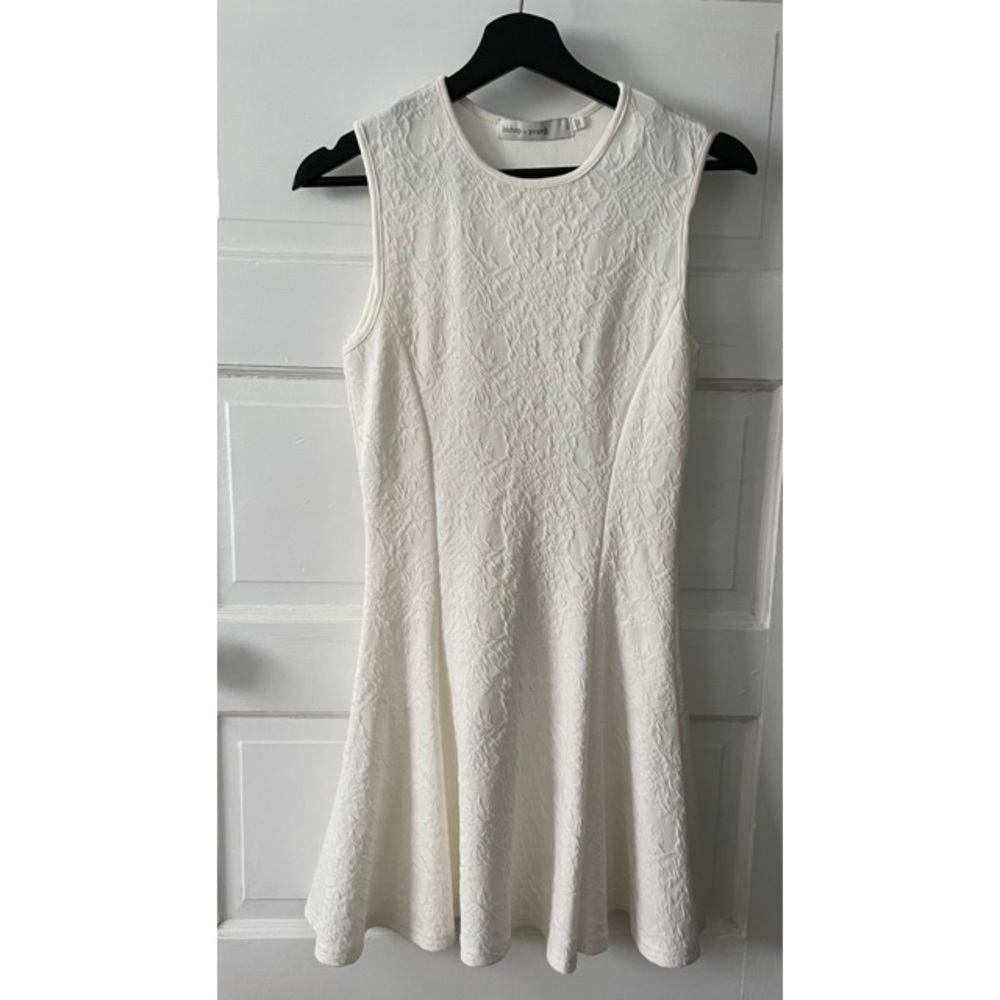 Ivory sleeveless Bishop + Young dress